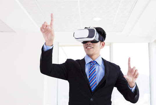 young Businessman wearing vrl glass at office