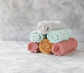 stack of towels on a marble table, a space under the text, selective focus