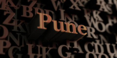 Pune - Wooden 3D rendered letters/message.  Can be used for an online banner ad or a print postcard.