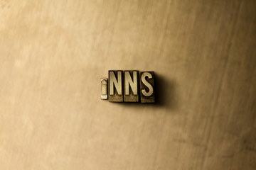 INNS - close-up of grungy vintage typeset word on metal backdrop. Royalty free stock illustration.  Can be used for online banner ads and direct mail.