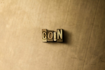 COIN - close-up of grungy vintage typeset word on metal backdrop. Royalty free stock illustration.  Can be used for online banner ads and direct mail.