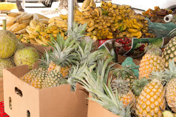 Exotic market where fresh bananas and pineapples are found