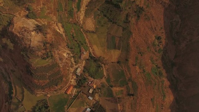 Peru Mountains Aerial v3 Flying over mountain hillsides looking down.