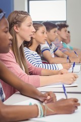 Students studying in classroom