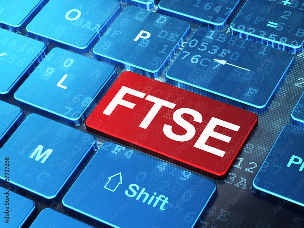 Poster stock market indexes concept: ftse on computer keyboard background