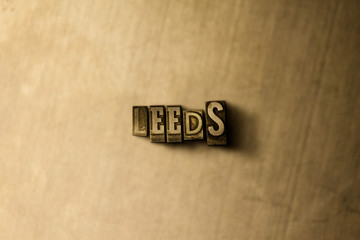 LEEDS - close-up of grungy vintage typeset word on metal backdrop. Royalty free stock illustration.  Can be used for online banner ads and direct mail.