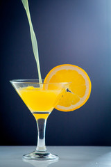 Orange juice glass isolated on background