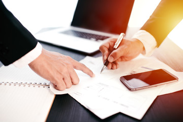 working day in office. two businessmen at work.