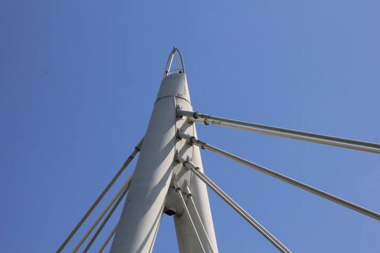 Fototapeta Detail of white cable-stayed bridge.