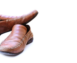 Fashion concept with male shoes on white background