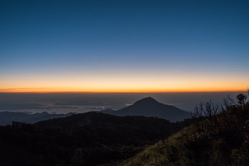 Sky and mountains after sunset in Kanchanaburi, Thailand.