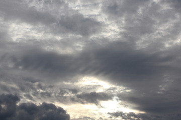 Naklejka na ściany i meble Clouds in gray sky 8191