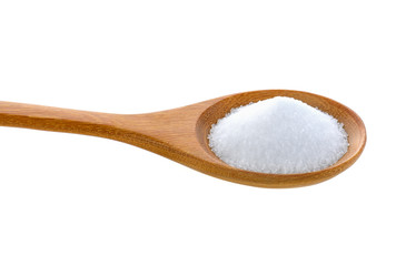 Salt in wooden spoon on white background