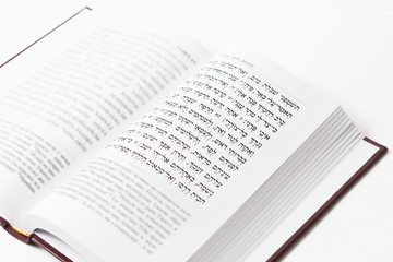 Jewish book on a white background, "Psalms of David", close-up. © ksana_uk