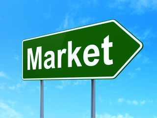 Marketing concept: Market on road sign background