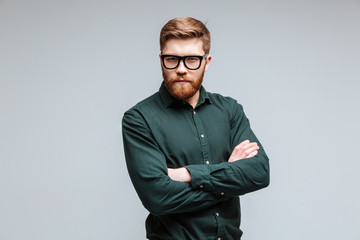 Serious Bearded man in shirt and eyeglasses