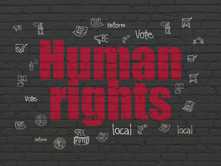 Politics concept: Human Rights on wall background