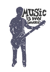 Silhouette of a musician with guitar with space inside and text Music is my Universe 