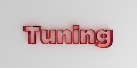 Tuning - Red glass text on white background - 3D rendered royalty free stock image.