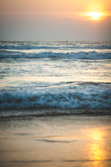 Fototapeta na wymiar Beautiful sunset over the ocean. Sunrise in the sea.