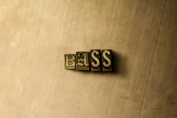 BASS - close-up of grungy vintage typeset word on metal backdrop. Royalty free stock illustration.  Can be used for online banner ads and direct mail.