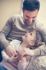 Father spending time with his daughter.