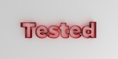 Tested - Red glass text on white background - 3D rendered royalty free stock image.