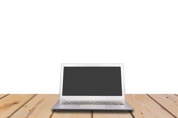 Fototapeta premium Laptop with blank screen on wooden table with white background,