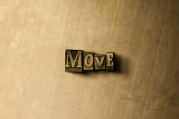 MOVE - close-up of grungy vintage typeset word on metal backdrop. Royalty free stock illustration.  Can be used for online banner ads and direct mail.