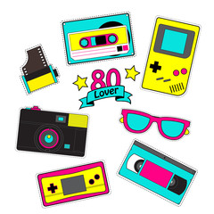 Fashion patch badges with game, photo camera, floppy disk, cassette tape, computer etc. Set of stickers, pins, patches in cartoon 80s-90s pop-art comic style.