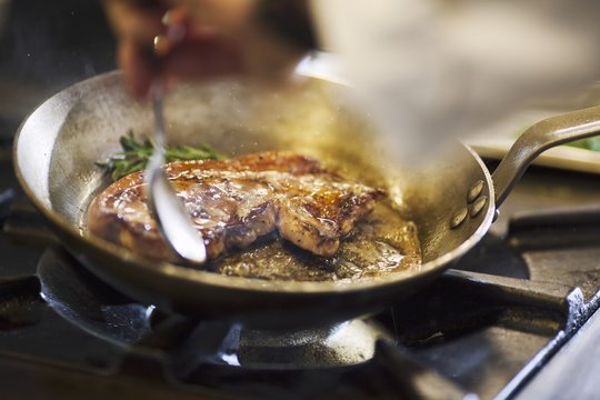 Fried beef steak in a pan