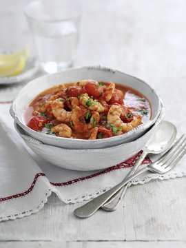 Tomato and prawn soup with parsley