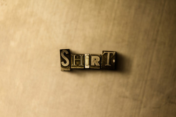 SHIRT - close-up of grungy vintage typeset word on metal backdrop. Royalty free stock illustration.  Can be used for online banner ads and direct mail.