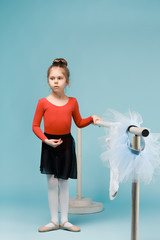 The little balerina dancer on blue background © master1305