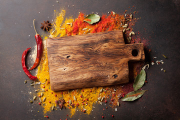 Various spices spoons and cutting board