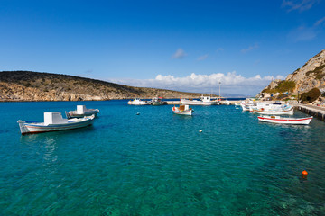 Fototapeta na wymiar Fishing boats in the harbor of Iraklia island in Lesser Cyclades, Greece.
