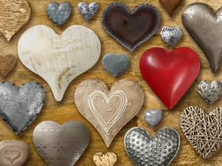 Hearts on wood background