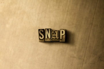 SNAP - close-up of grungy vintage typeset word on metal backdrop. Royalty free stock illustration.  Can be used for online banner ads and direct mail.