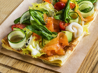 Pancakes stuffed with seafood