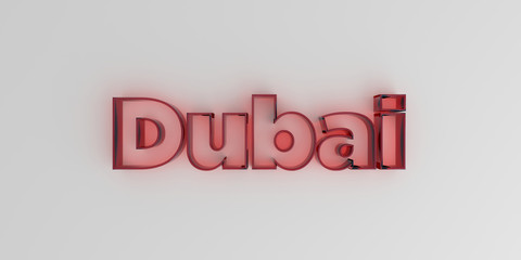 Dubai - Red glass text on white background - 3D rendered royalty free stock image.