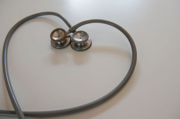 Fototapeta na wymiar closeup two stethoscope on White table . Medical concept .