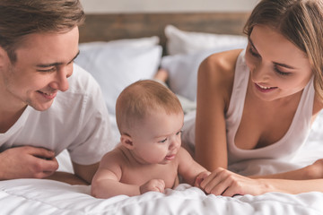 Young couple with baby © georgerudy