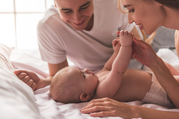 Young couple with baby © georgerudy