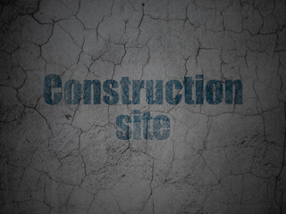 Building construction concept: Construction Site on grunge wall background