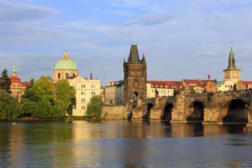 Fototapeta na wymiar View on the Charles Bridge at the Vltava River, with the Old Town Bridge Tower in Prague, Czech Republic, Europe