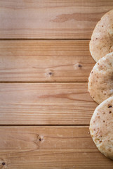 Pita, Arabic bread, wooden background, free text space