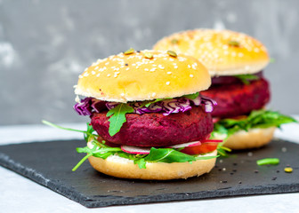 Veggie beet and lentil burgers with vegetables. Love for a healthy vegan food concept