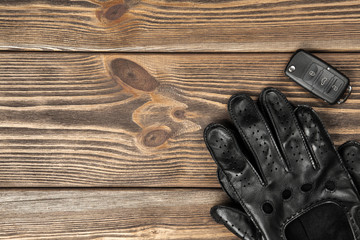 Car keys and driving gloves