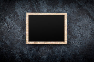 Picture frame on a grey wall