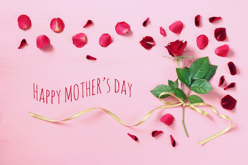 mother's day concept with rose on pink background